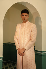 Raw silk sherwani in a soft pink hue, featuring intricate hand embroidery SW1403